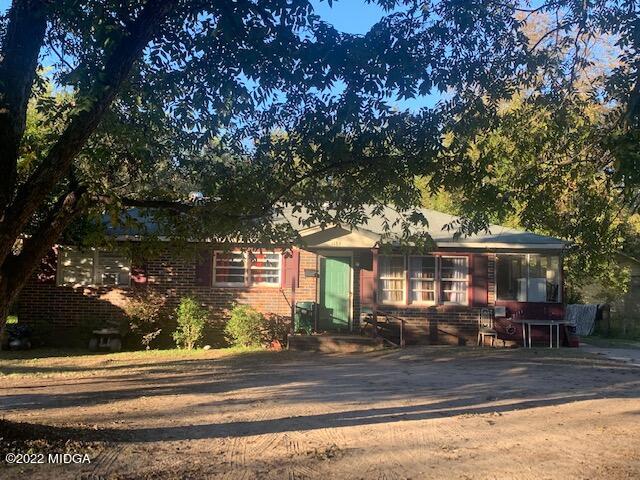 1189 Hartley Street Macon, GA 31206 - Photo 1 of 1 front view of house with a street