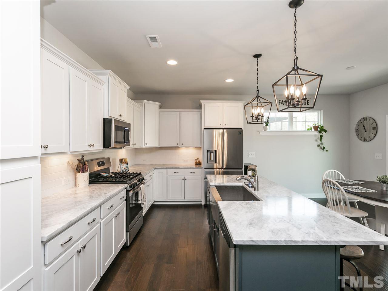 536 Future Islands Way Wendell, NC 27591 - Photo 4 of 27 Marble countertops, plenty of prep space and storage