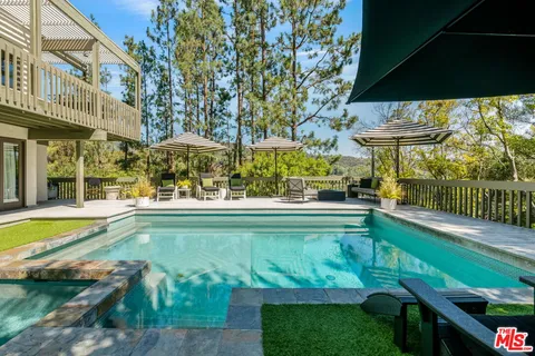 a view of a patio on the roof deck