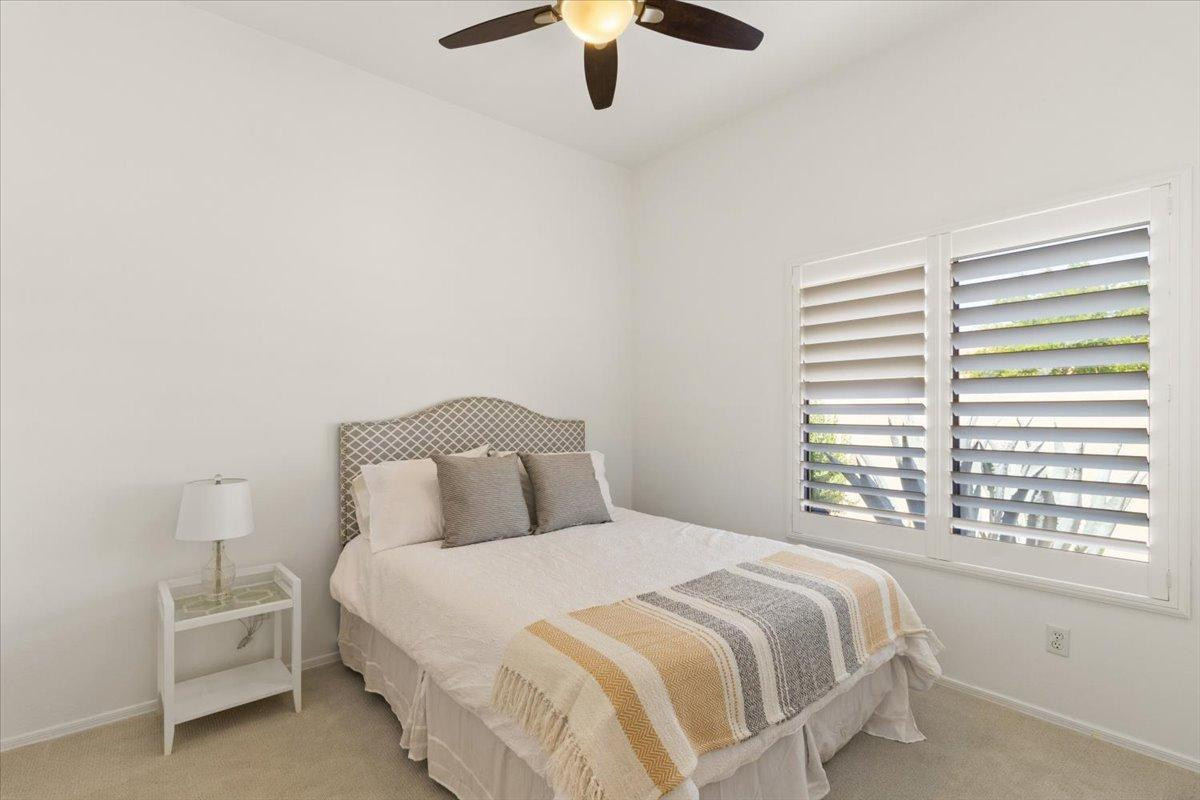 4211 East Kirkland Road Phoenix, AZ 85050 - Photo 14 of 23 a bedroom with a bed and a window