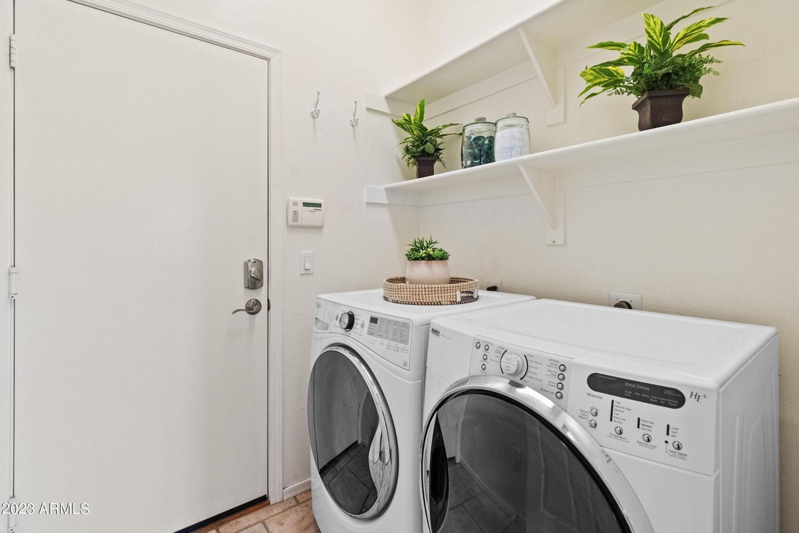 4211 East Kirkland Road Phoenix, AZ 85050 - Photo 17 of 23 a utility room with dryer and washer