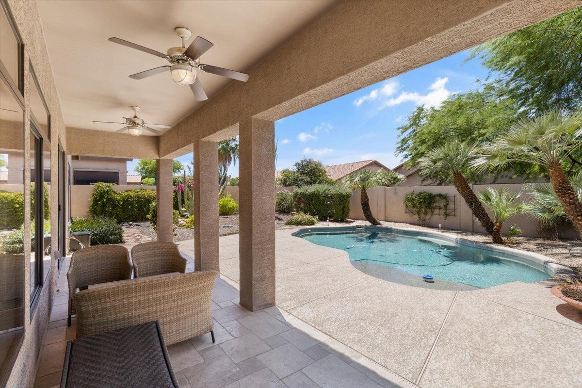 4211 East Kirkland Road Phoenix, AZ 85050 - Photo 20 of 23 a view of a porch with furniture and a yard