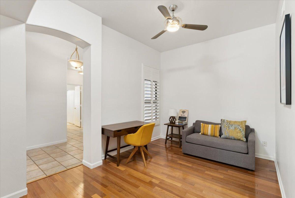 4211 East Kirkland Road Phoenix, AZ 85050 - Photo 7 of 23 a living room with furniture and a wooden floor