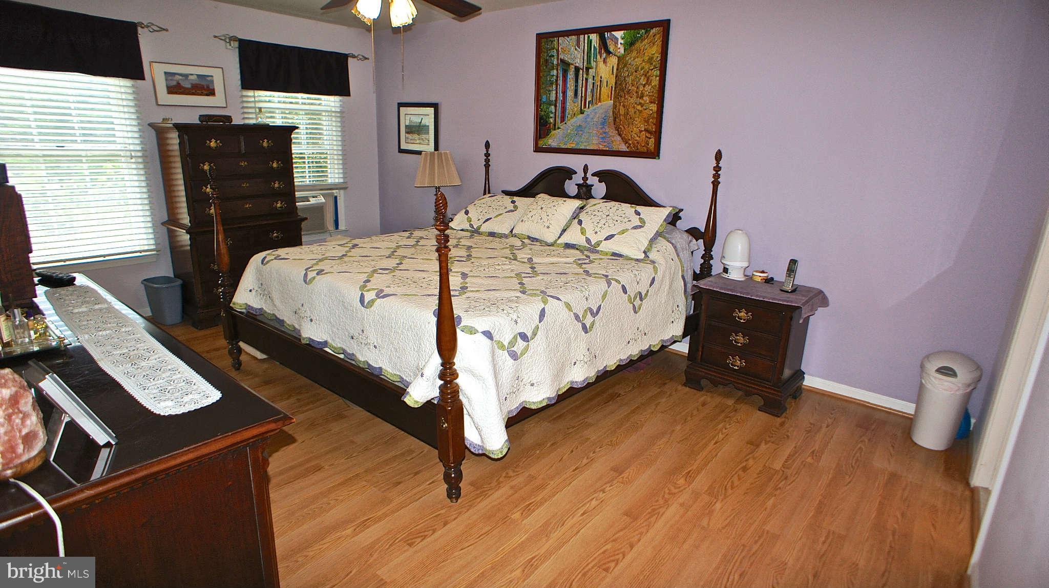 20605 Bell Bluff Road Gaithersburg, MD 20882 - Photo 11 of 18 Master Bedroom with hardwood floors
