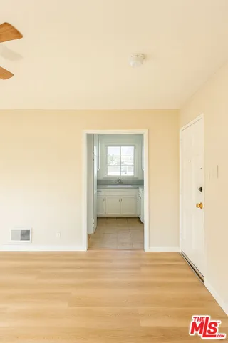 a view of an empty room and window