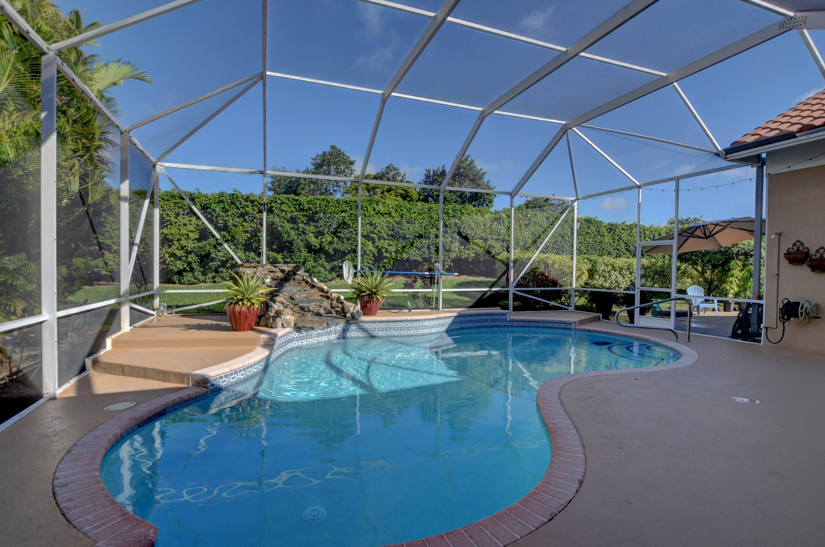 10546 Maple Chase Drive Boca Raton, FL 33498 - Photo 31 of 39 Large Screened in Pool Area