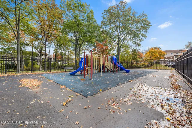 a view of a park with swings