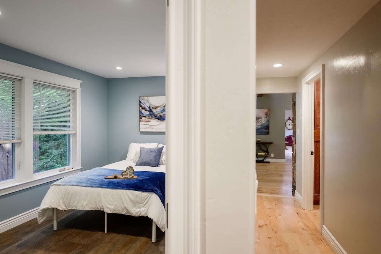 295 Jim's Road Ben Lomond, CA 95005 - Photo 84 of 139 a bedroom with a bed and window