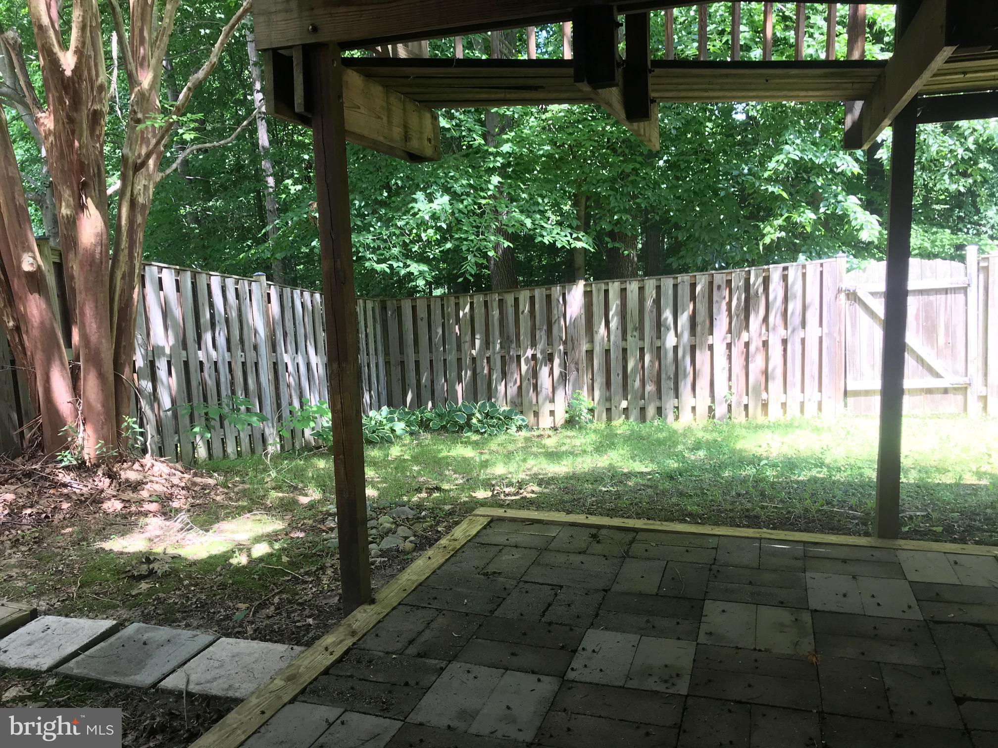 6249 Rathlin Drive Springfield, VA 22152 - Photo 27 of 38 Back paver patio and large fenced yard