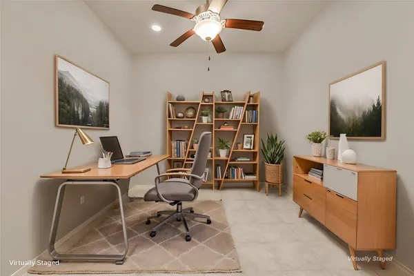 a view of a workspace with furniture