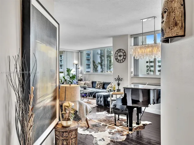 a living room with furniture and a table