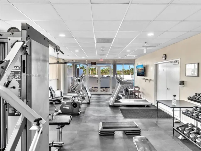 a living room with furniture and white walls