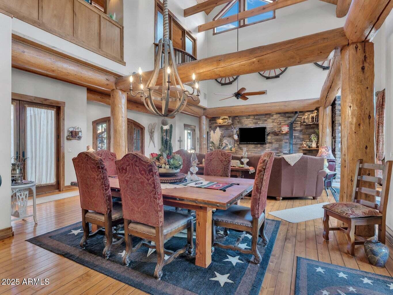 9361 Juniper Road Strawberry, AZ 85544 - Photo 19 of 104 a view of a dining room with furniture window and wooden floor