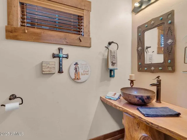 a view of an chairs and tables in the balcony