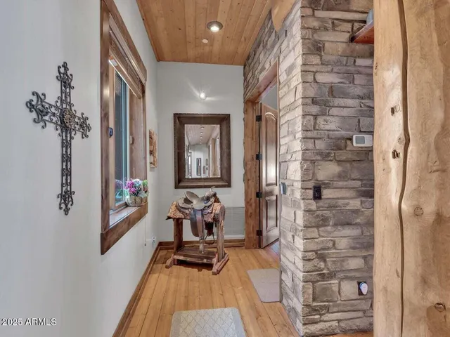 a view of a patio with wooden floor