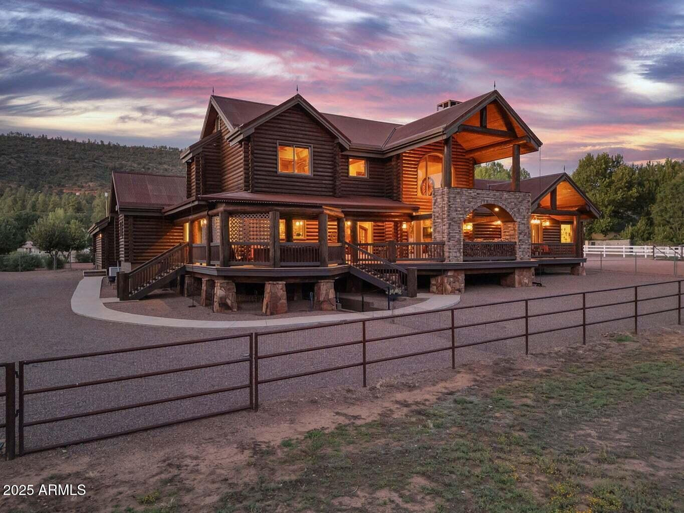 9361 Juniper Road Strawberry, AZ 85544 - Photo 3 of 104 a front view of a house with a yard