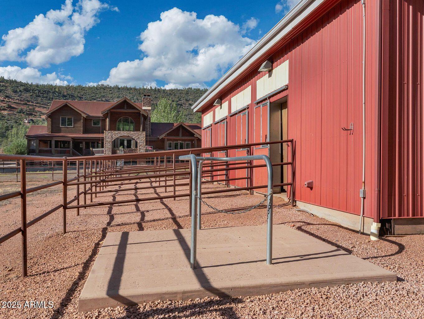 9361 Juniper Road Strawberry, AZ 85544 - Photo 74 of 104 a view of a balcony with wooden floor and city view