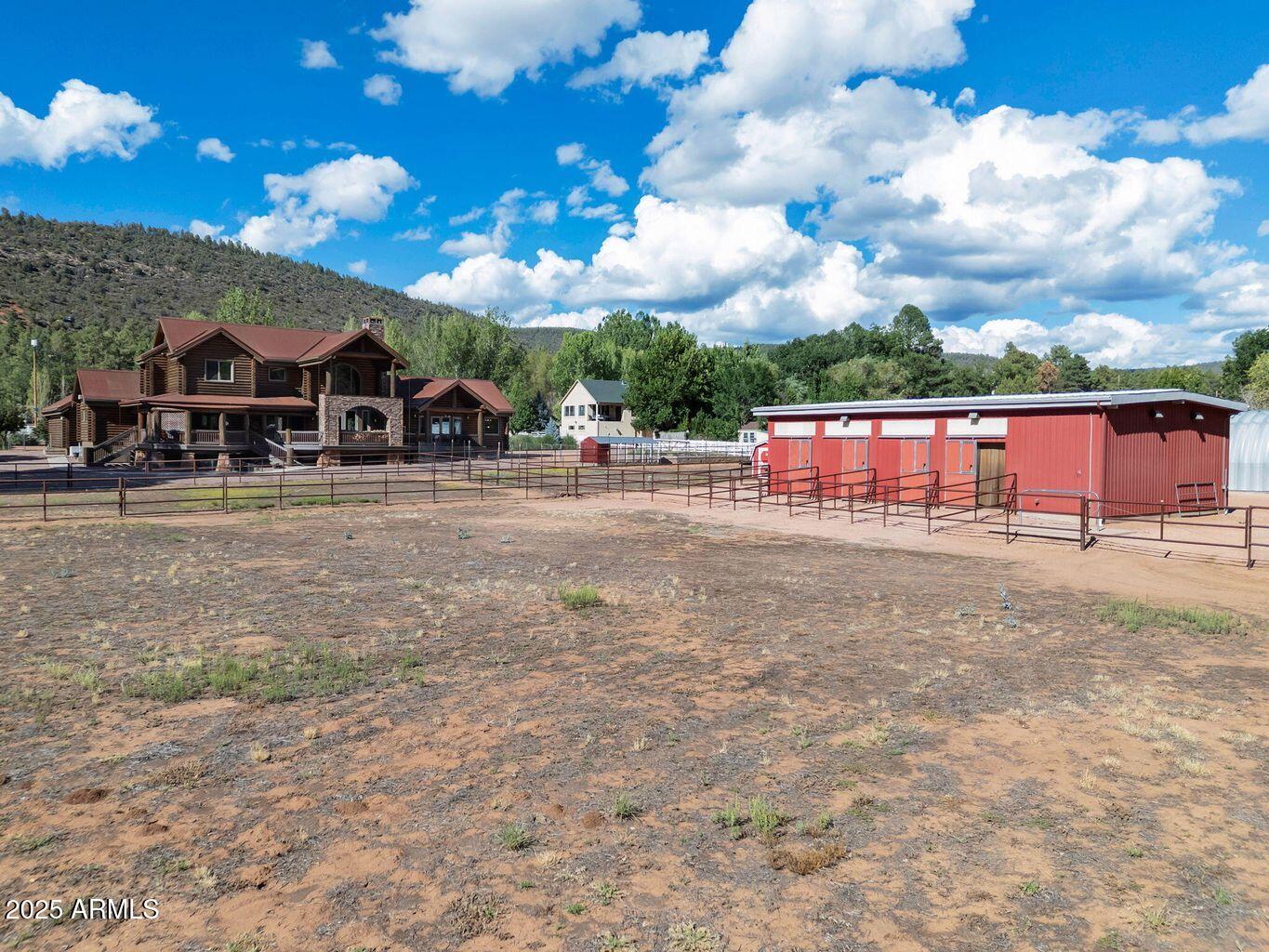 9361 Juniper Road Strawberry, AZ 85544 - Photo 77 of 104 a view of a house with a big yard
