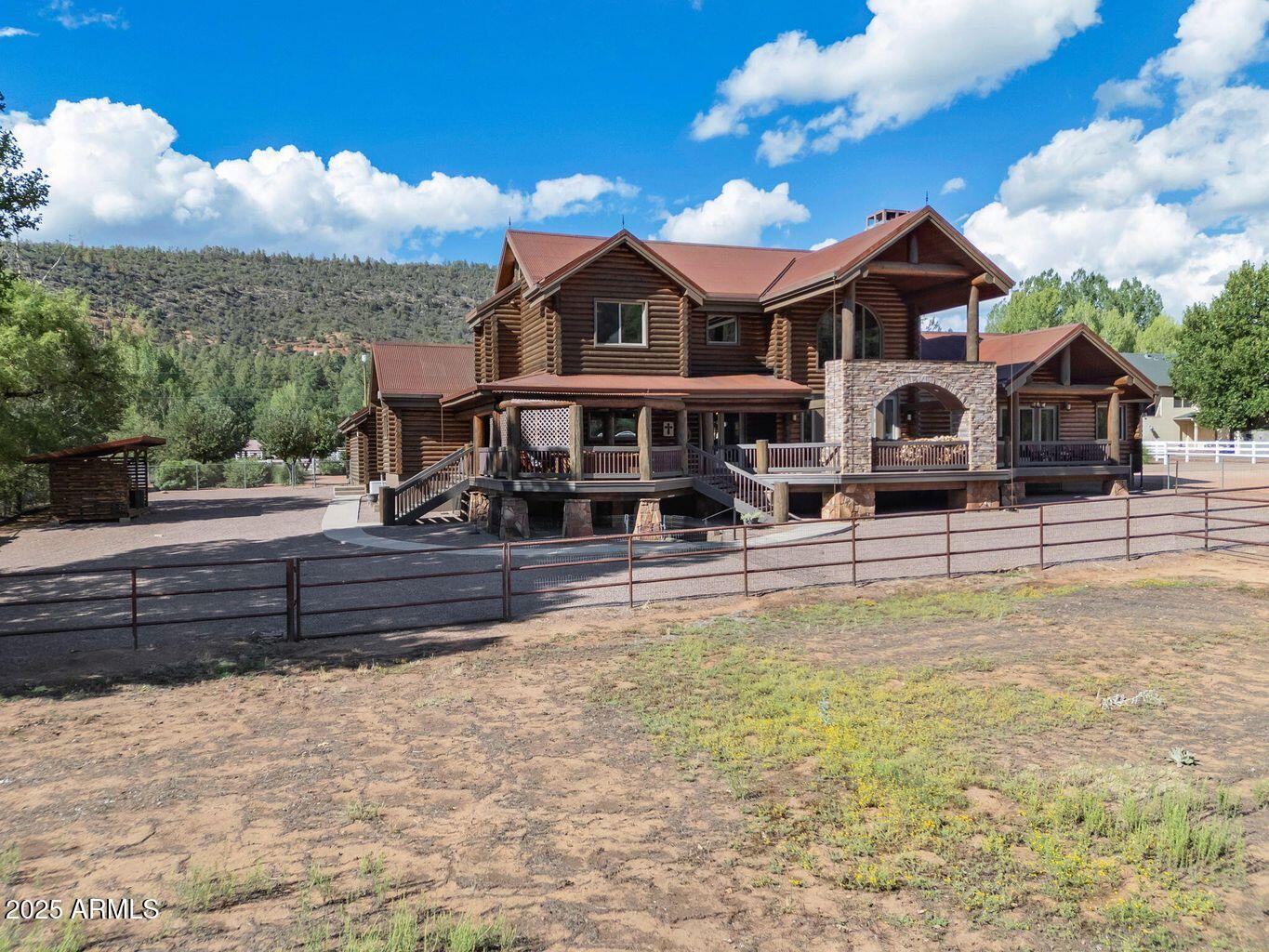 9361 Juniper Road Strawberry, AZ 85544 - Photo 85 of 104 a front view of a house with a yard