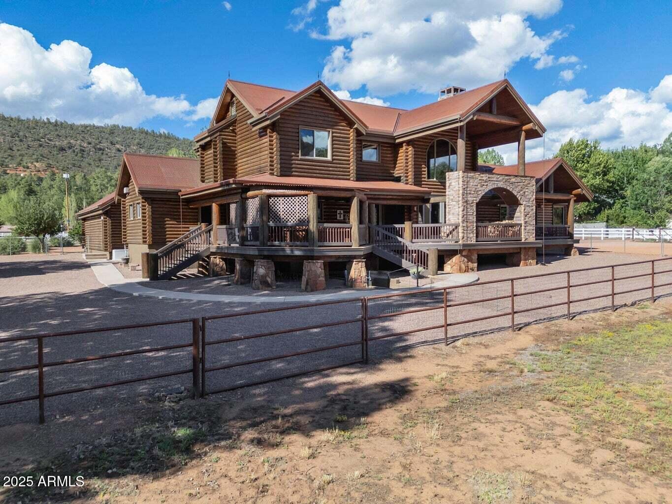 9361 Juniper Road Strawberry, AZ 85544 - Photo 10 of 104 a front view of a house with a yard