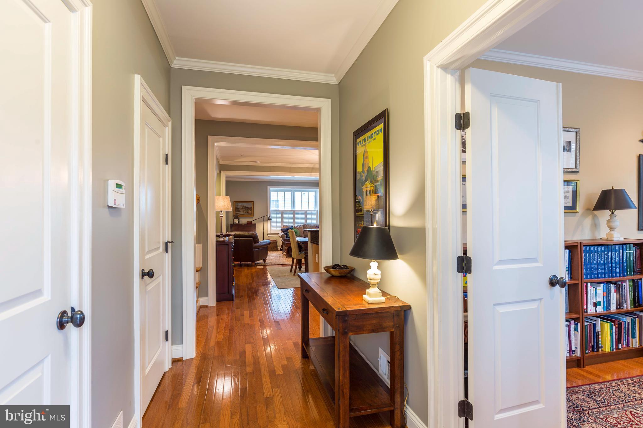 8815 Courts Way Silver Spring, MD 20910 - Photo 9 of 30 Foyer/Hallway with Gleaming Hardwood Floors.