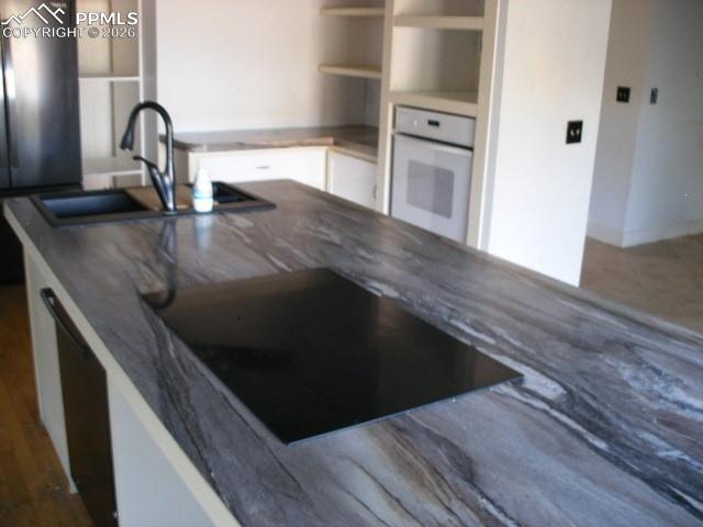 1360 Fawnwood Road Monument, CO 80132 - Photo 14 of 50 a close view of sink and tap