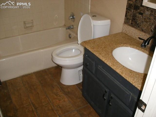 1360 Fawnwood Road Monument, CO 80132 - Photo 20 of 50 a bathroom with a granite countertop sink toilet and shower