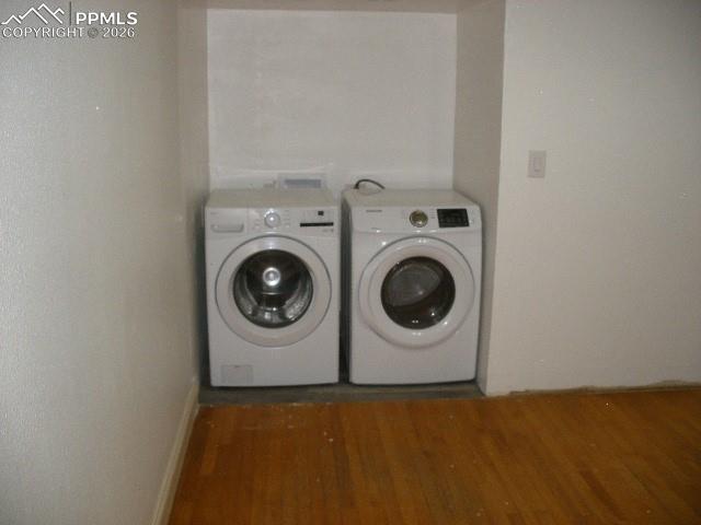 1360 Fawnwood Road Monument, CO 80132 - Photo 24 of 50 a utility room with dryer and washer