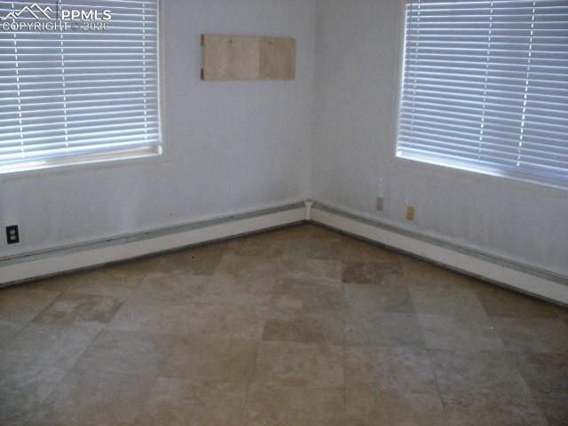 1360 Fawnwood Road Monument, CO 80132 - Photo 40 of 50 an empty room with a window