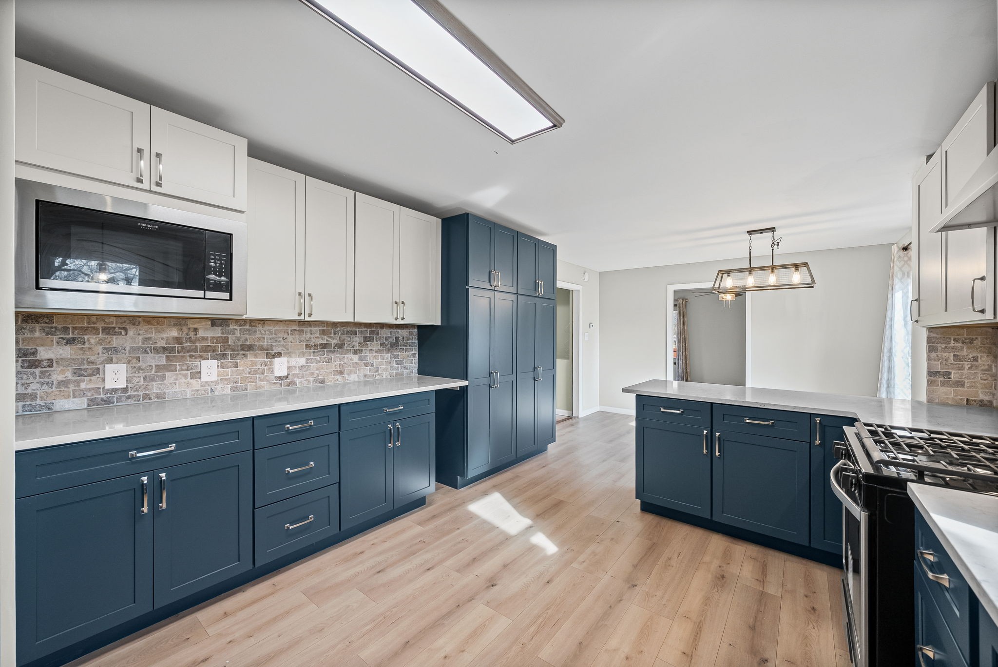 3012 Cox Mill Road Hopkinsville, KY 42240 - Photo 11 of 37 a kitchen with stainless steel appliances granite countertop a stove and a sink