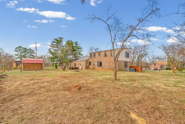 a black and white photo of a living room