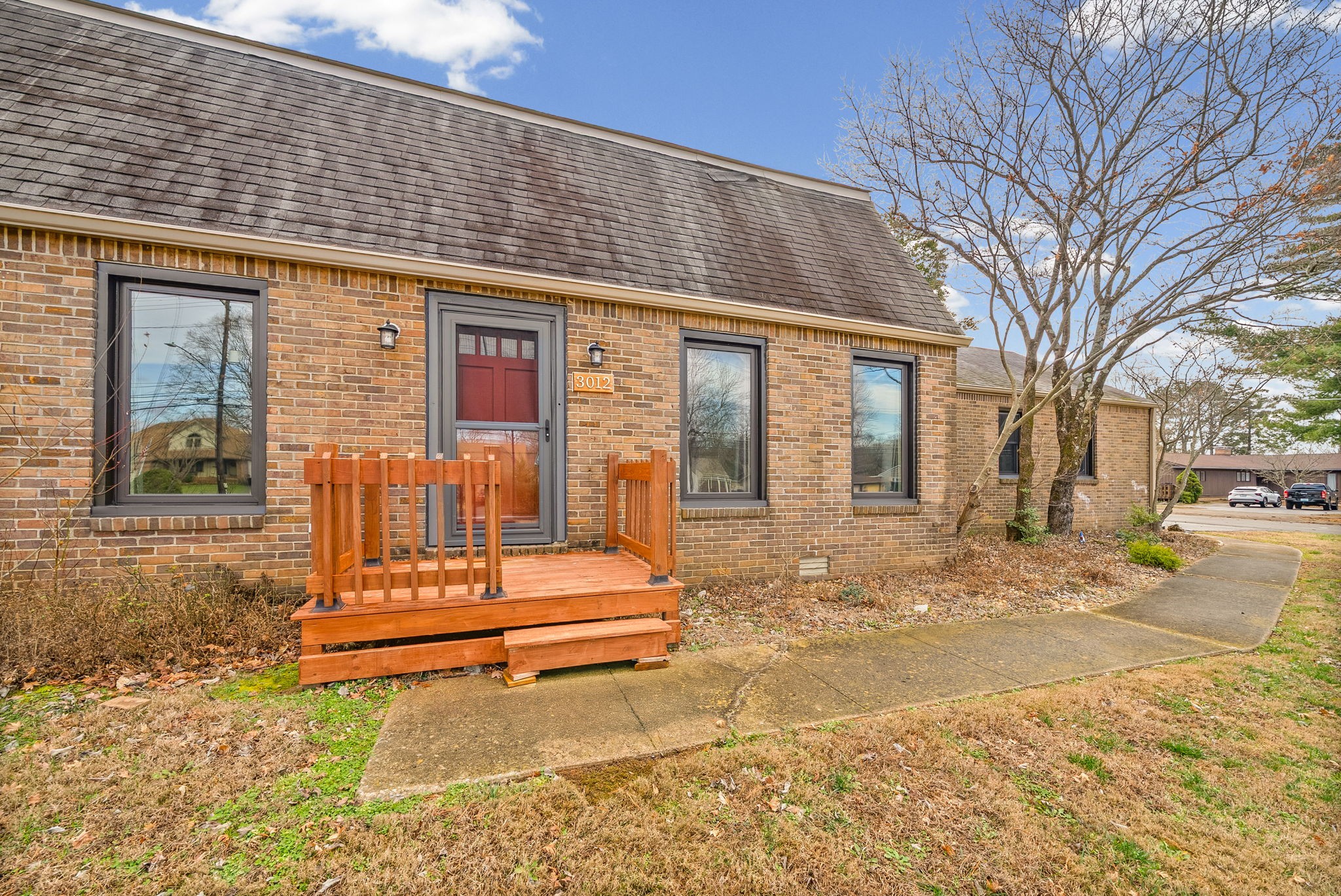 3012 Cox Mill Road Hopkinsville, KY 42240 - Photo 4 of 37 a front view of a house with a large window