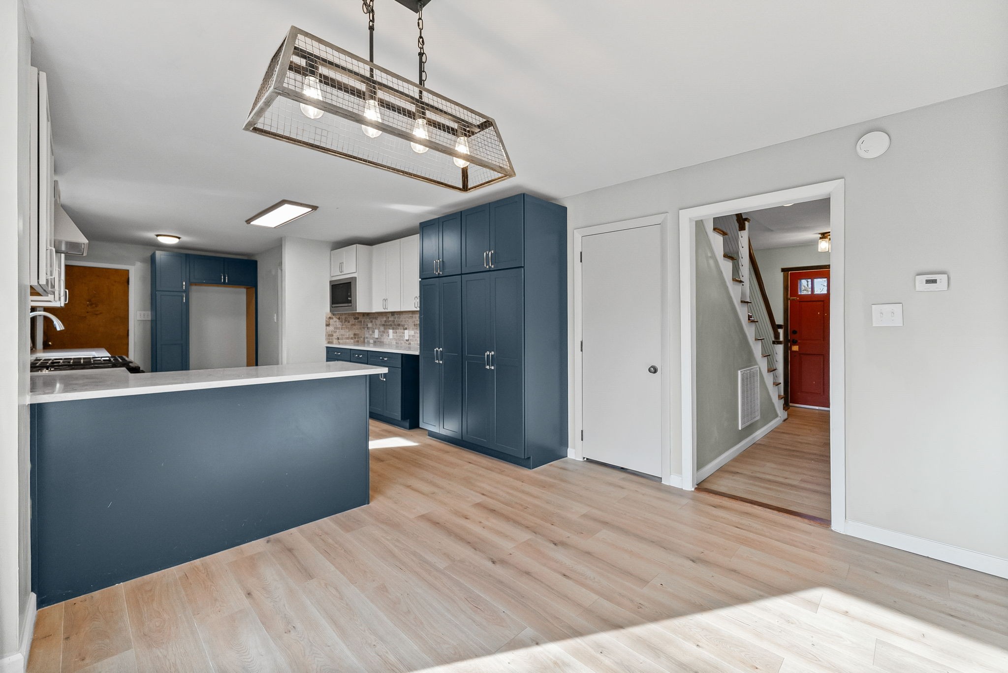 3012 Cox Mill Road Hopkinsville, KY 42240 - Photo 8 of 37 a view of a kitchen with wooden floor and a hallway