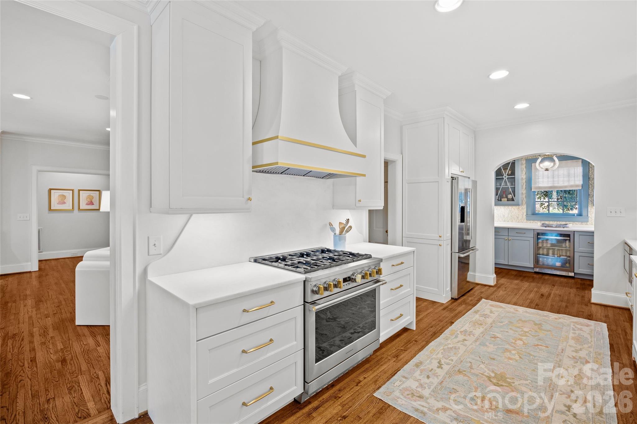 1950 Sterling Road Charlotte, NC 28209 - Photo 14 of 48 a kitchen with stainless steel appliances granite countertop a stove and a sink