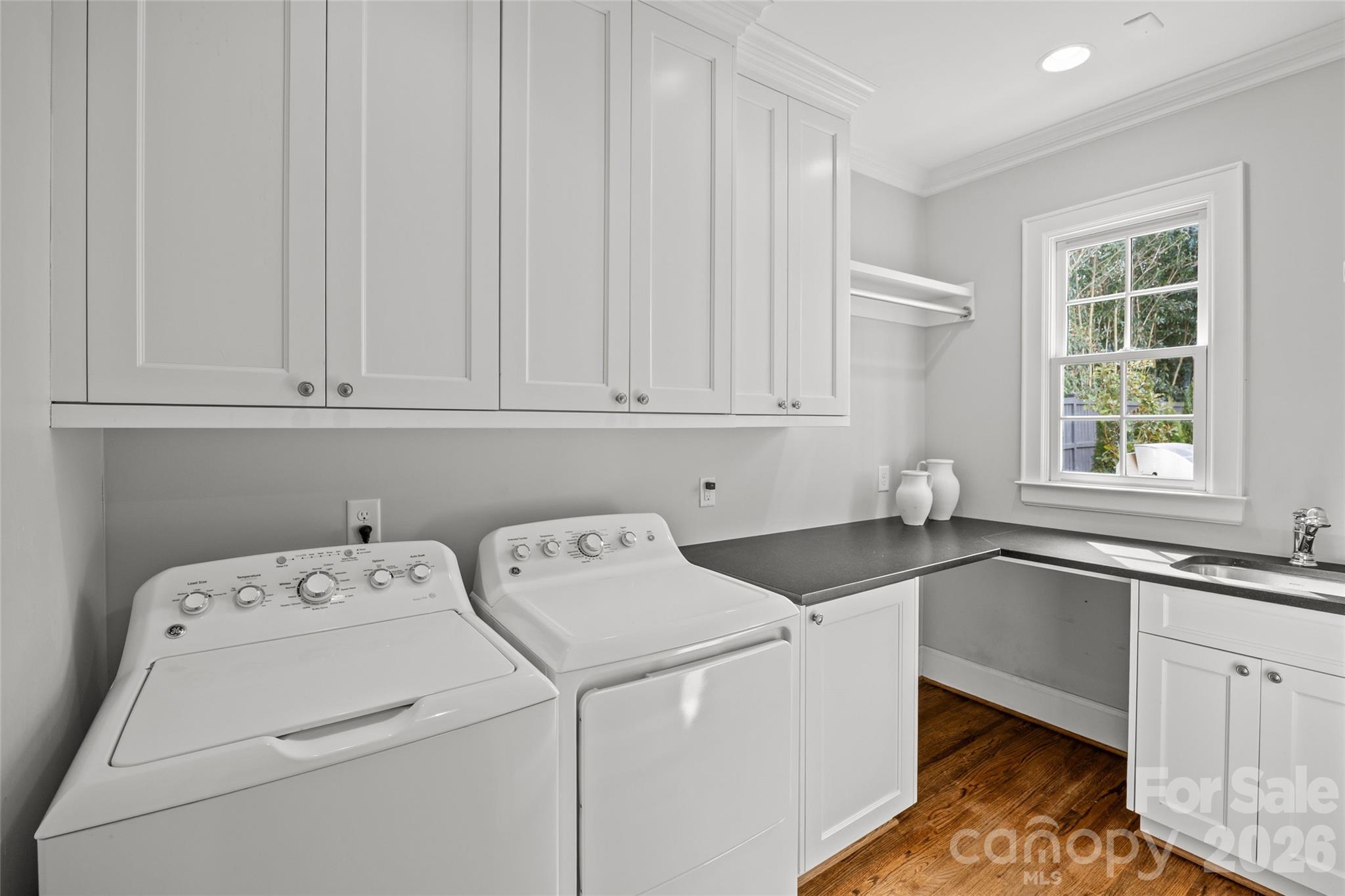 1950 Sterling Road Charlotte, NC 28209 - Photo 23 of 48 a utility room with dryer and washer