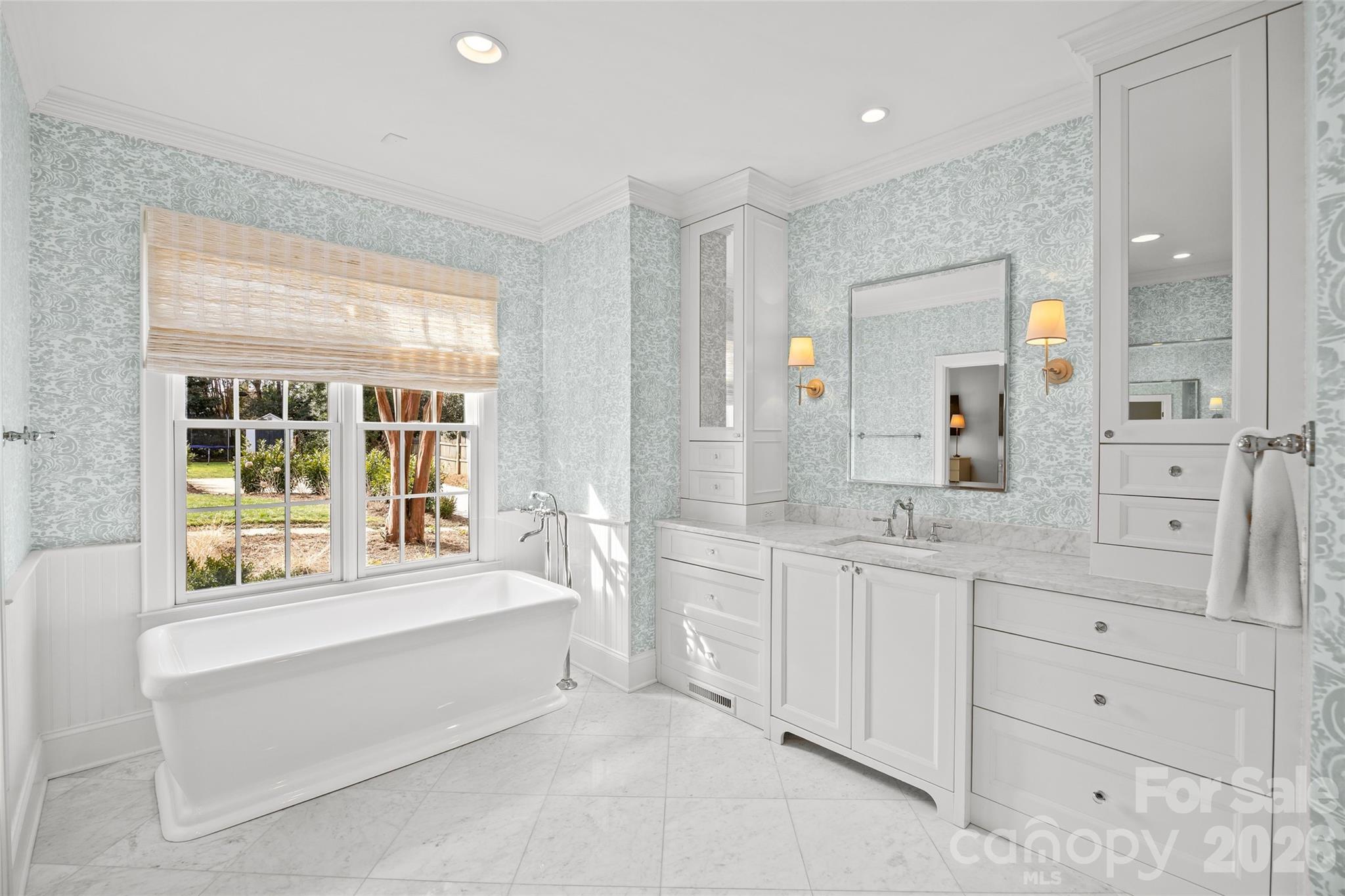 1950 Sterling Road Charlotte, NC 28209 - Photo 26 of 48 a spacious bathroom with a granite countertop sink mirror and bathtub