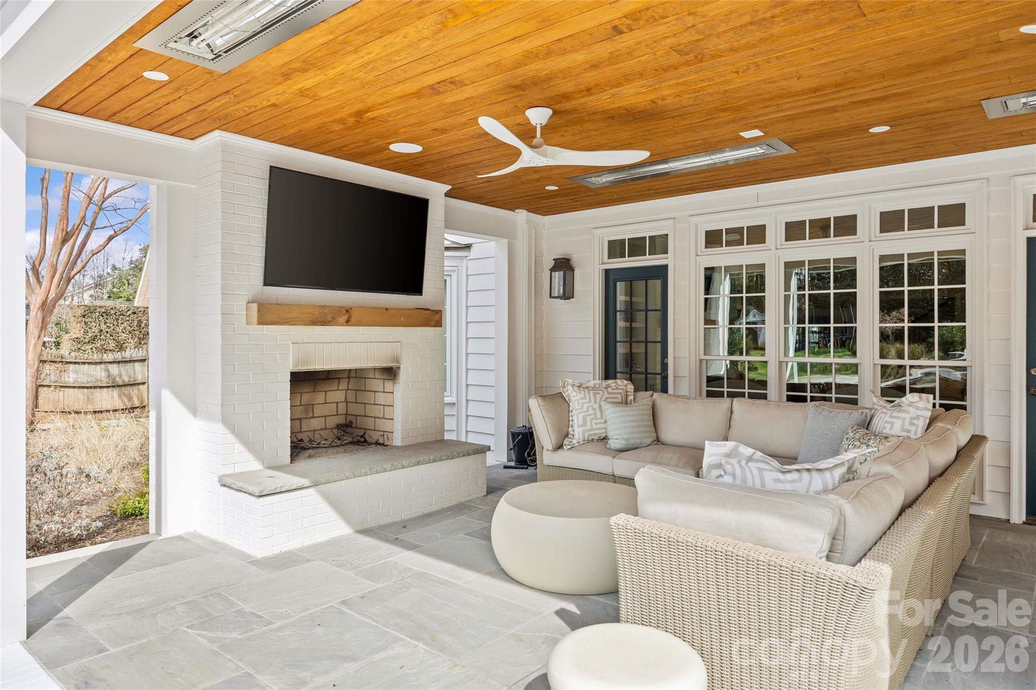 1950 Sterling Road Charlotte, NC 28209 - Photo 40 of 48 a living room with furniture fireplace and a flat screen tv