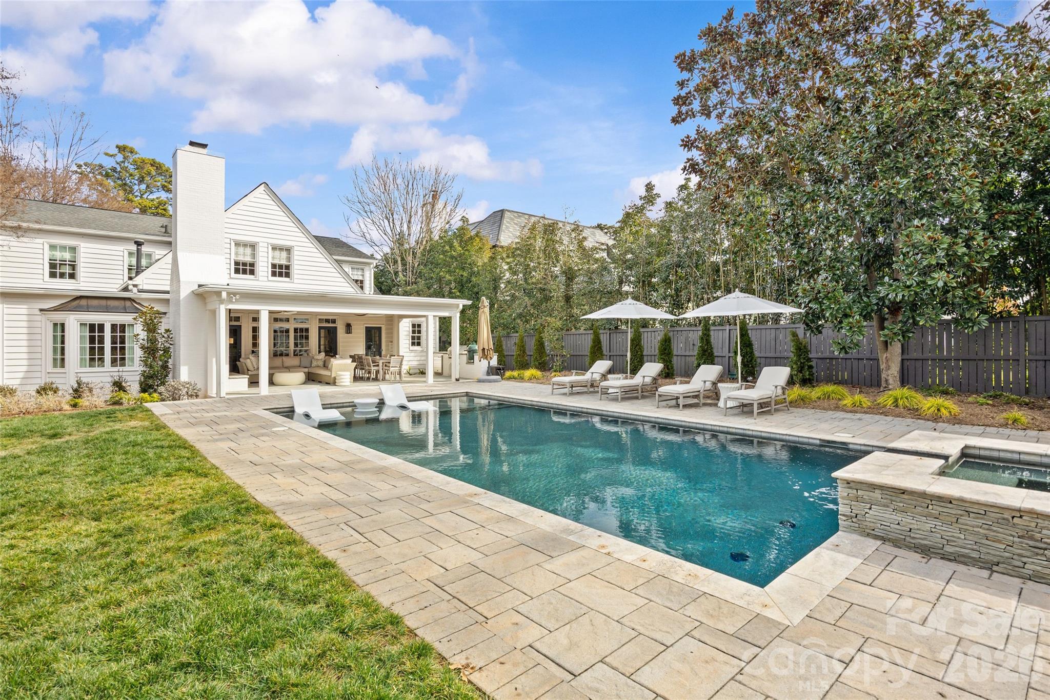 1950 Sterling Road Charlotte, NC 28209 - Photo 44 of 48 a view of a house with swimming pool and a yard