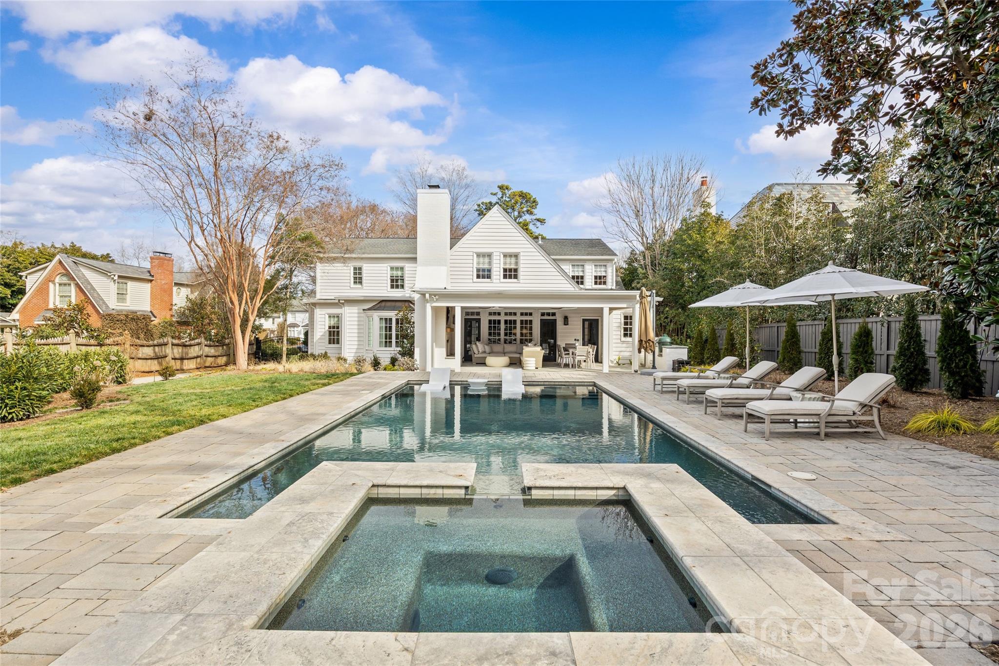 1950 Sterling Road Charlotte, NC 28209 - Photo 45 of 48 a view of house with swimming pool and sitting area