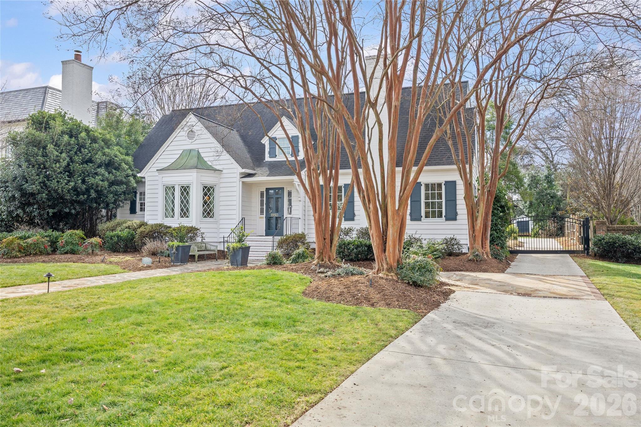 1950 Sterling Road Charlotte, NC 28209 - Photo 48 of 48 a front view of a house with a yard