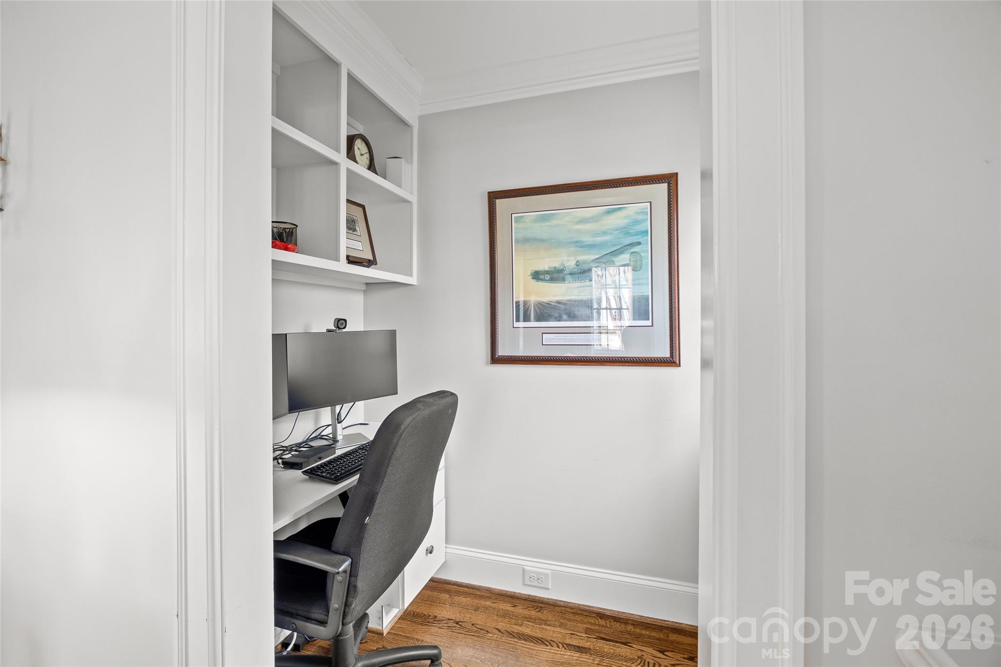1950 Sterling Road Charlotte, NC 28209 - Photo 10 of 48 a view of a workspace with furniture and wooden floor