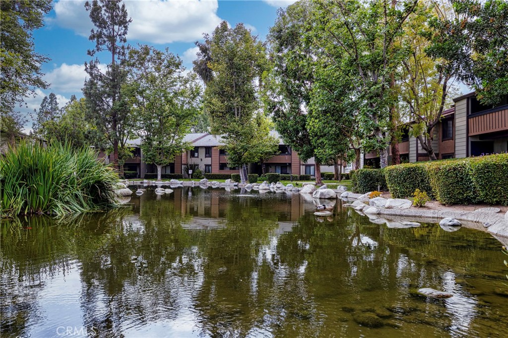 20702 El Toro Road, Unit 178 Lake Forest, CA 92630 - Photo 25 of 30 a view of a lake with house