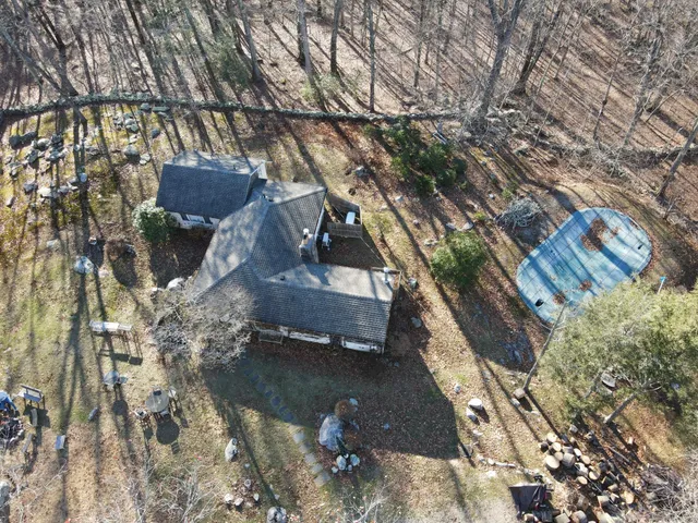 a view of a backyard of the house