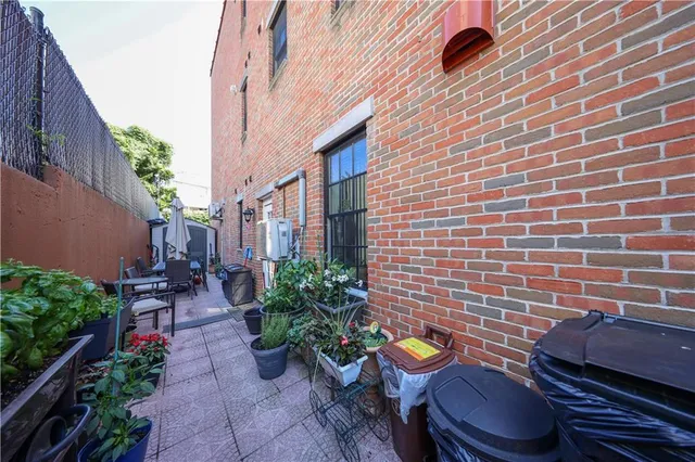 an aerial view of multiple houses with yard