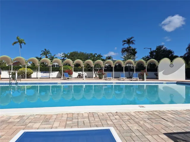 a view of a house with a swimming pool