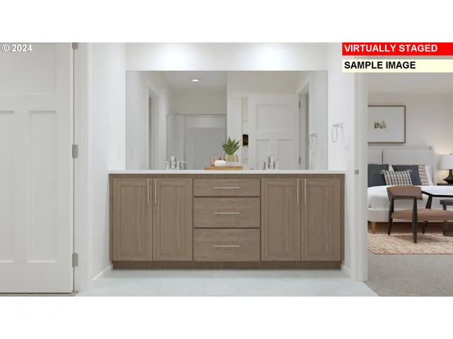 a bathroom with a sink a mirror and a vanity