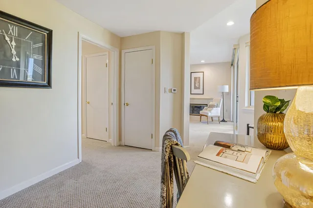 a bedroom with a bed and ceiling fan