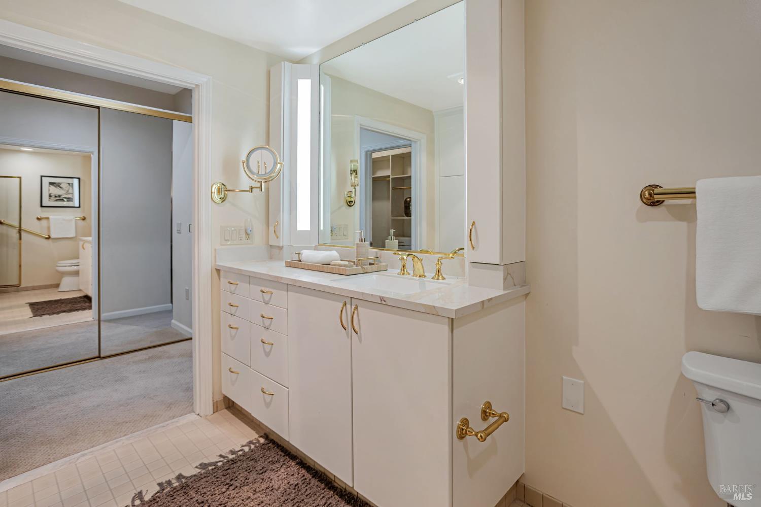 300 Deer Valley Road, Unit 3P San Rafael, CA 94903 - Photo 13 of 23 a bathroom with a sink a toilet and shower