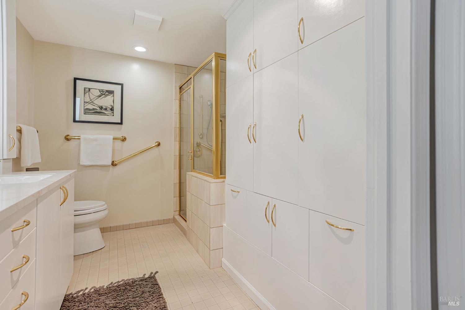 300 Deer Valley Road, Unit 3P San Rafael, CA 94903 - Photo 15 of 23 a bathroom with a toilet sink and a shower