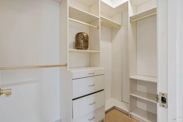 a view of cabinets and window